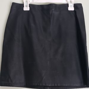 Black faux leather mini skirt.